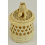 A Japanese Meiji period carved ivory cricket cage with wicker basket effect reticulated sides and