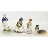 Four Royal Copenhagen porcelain figures, a girl with a goose beside, a duck,
