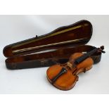 A full sized German violin, Guarneri copy, with two-piece back, length 35.