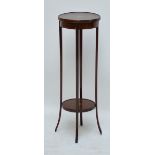An Edwardian mahogany and inlaid circular two tier jardinière stand on square section tapering legs,