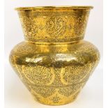 A large Eastern brass vase/jardiniere of squat baluster form with flared pierced rim,