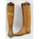 A pair of four piece wooden boot stretchers with metal circular handles, approx size 4/5.