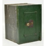 A late Victorian green painted Geering & Co iron safe complete with key, width 46cm (af).