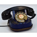 A vintage blue and gilt heightened bell telephone, the receiver inscribed "Propriete de L'Etat",