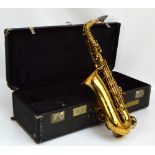 A Buffet "Super Dynaction" brass alto saxophone with engraved decoration, serial number 6901, cased.