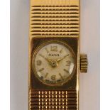 OLMA; a lady's vintage 9ct gold wristwatch with integral bracelet, approx 30.6g.