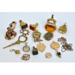 A group of nine various yellow metal mounted seal fobs set with various stones to include a