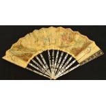 A late 18th century folding fan with pierced and silver inlaid mother of pearl guards,