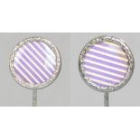 A pair of sterling silver rimmed circular hat pins with purple and white striped centres,