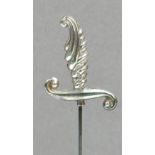 A George V hallmarked silver hat pin in the form of a sword hilt with swathed and curved guard,