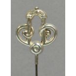 A George V hallmarked silver hat pin of symmetrical double sided abstract form, Pearce & Thompson,