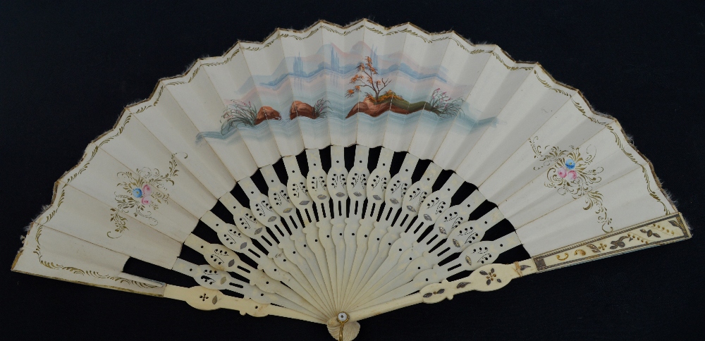 A early 19th century European folding fan with pierced shaped and metal inlaid bone guards and - Image 2 of 2
