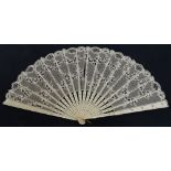A 19th century French folding fan, the shaped bone sticks with studded metallic pattern,