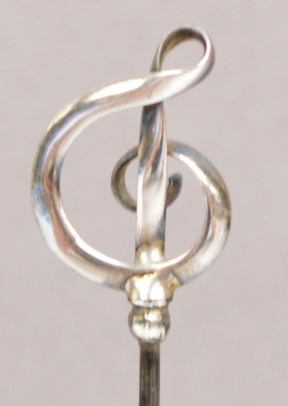 A pair of Charles Horner sterling silver hat pins in the form of looped ribbon treble clefs, - Image 2 of 2