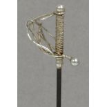 A Charles Horner hallmarked silver hat pin in the form of a sword with textured grip and knuckle