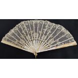 An early 19th century folding fan with plain mother of pearl guards and sticks with pierced bone