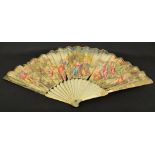 A late 18th century European folding fan with carved ivory guards with flowers and a figure and