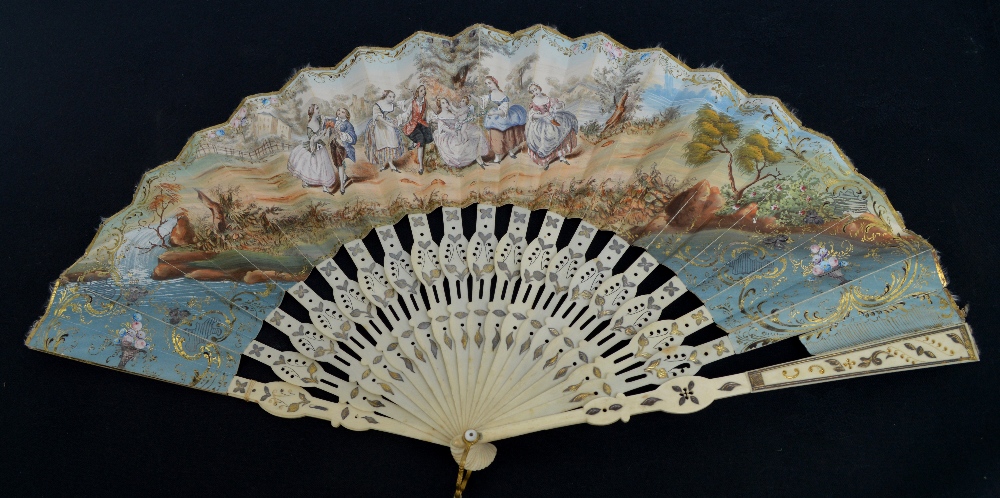 A early 19th century European folding fan with pierced shaped and metal inlaid bone guards and