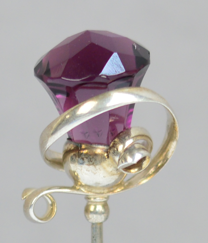 A Charles Horner sterling silver hat pin in the form of a large amethyst coloured glass thistle