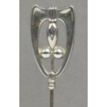 A Charles Horner hallmarked silver hat pin of abstract form with a geometric pattern within a