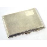 A George V hallmarked silver engine turned cigarette case, Birmingham 1929, approx 2.