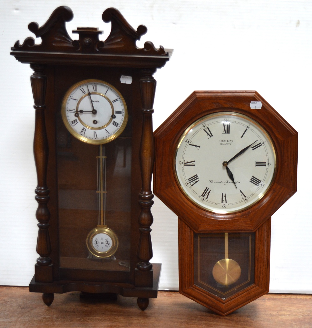 A modern Seiko Quartz Westminster-Whittington wall clock and a modern Hermel wall clock (2).