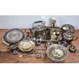 A large quantity of metalware to include plated candelabra, a tray with gallery edge,