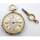 A silver pocket watch, the silver and gilded dial set with Roman numerals, marked silver,