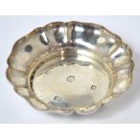 An Elizabeth II hallmarked silver shallow bowl with fluted rim, London, approx 2.