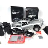 A James Bond 007 'Goldfinger' partially complete Aston Martin DB5 Metal sports car model kit,