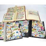 Two stock books and one album containing mainly German stamps, many stock cards,