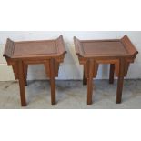 A pair of Chinese hardwood stools with stepped aprons, dimensions of seats 50 x 35cm.