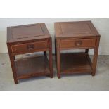 A pair of Chinese hardwood single drawer bedside cabinets, width 46cm.