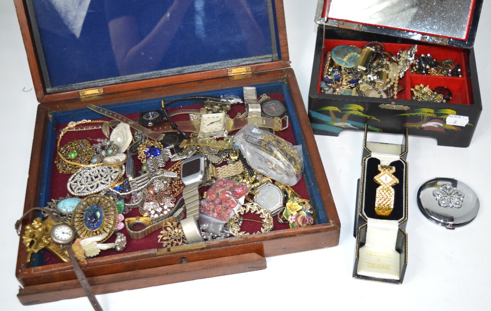 A quantity of costume jewellery and watches, to include a yellow metal framed cameo brooch,