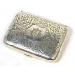 An Edward VII hallmarked silver engraved cigarette case, Sheffield 1905, approx 2.5ozt.