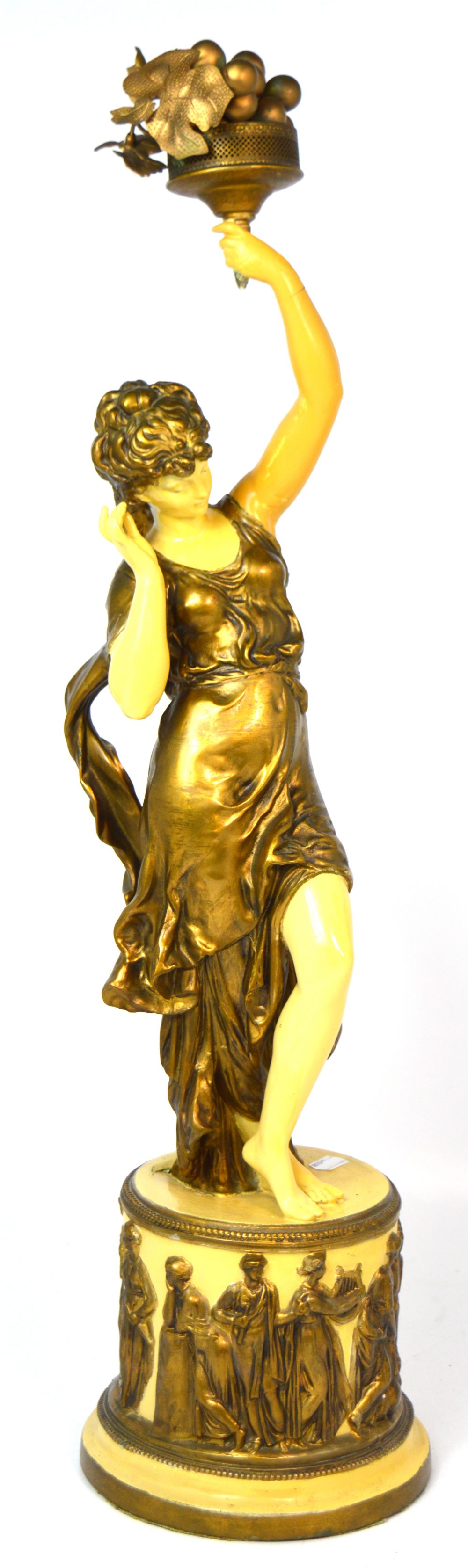 A painted spelter figural lamp modelled as a young girl on rounded base, height 77cm (af).
