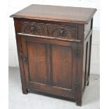 An oak priory style cabinet,