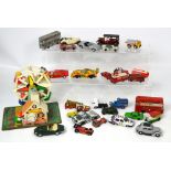 A quantity of loose largely playworn diecast vehicles to include Dinky, Matchbox,