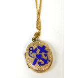 A yellow metal locket with blue anchor and cross enamel decoration suspended on a 9ct yellow gold