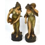 A pair of continental porcelain female water carriers, both signed Schoop to the reverse,