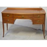 A reproduction serpentine front sideboard of small proportions,