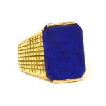 A yellow metal and lapis lazuli gentleman's ring, size U, approx 17.4g.