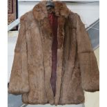 A vintage ladies' rabbit fur jacket.