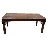 A pine rectangular kitchen table on turned legs with metal bracket supports, length 192cm.