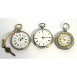 Three hallmarked silver pocket watches, a J Graves example with enamel dial set with Roman numerals,