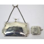 A Edward VII hallmarked silver purse with chain handle,