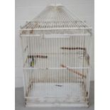 A large white painted metal parrot cage with a domed top, 150 x 90cm.