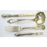 A William IV hallmarked silver fork, Edinburgh 1832, a Victorian hallmarked silver knife,