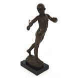 A hot cast bronze on a marble base of a male figure, 'David' with sling when fighting Goliath,