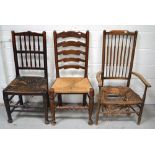 Three 19th century chairs to include a ladder back example with rush seat on turned stretchers and